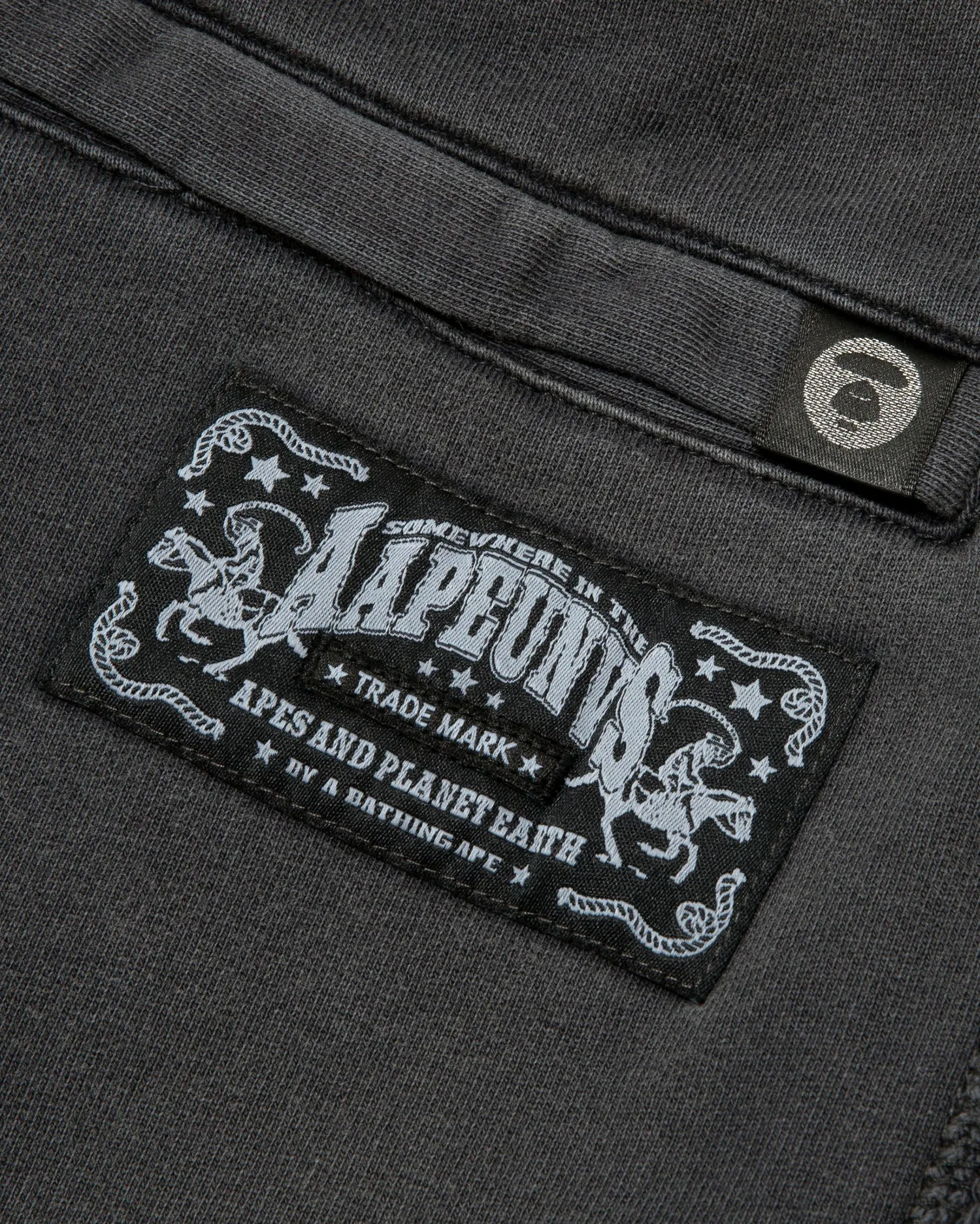 AAPEUNVS moonface logo sweat pants