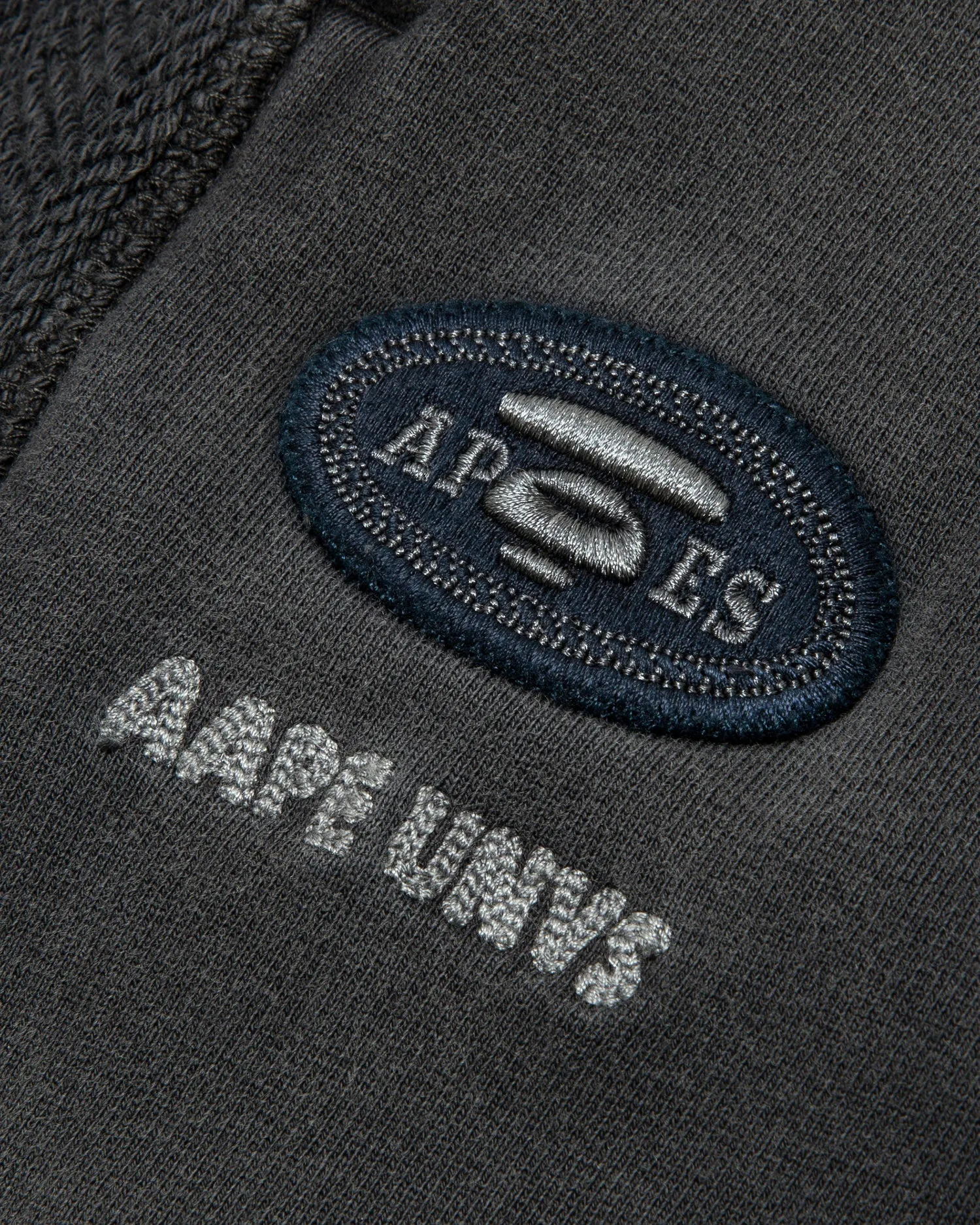 AAPEUNVS moonface logo sweat pants
