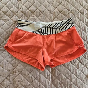 Lululemon red strap decor athletic shorts size S
