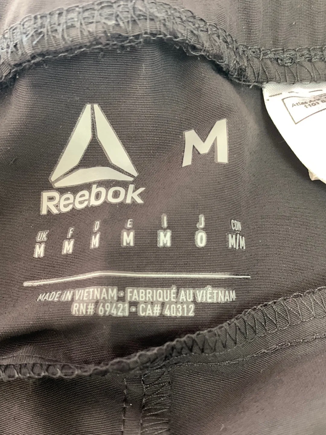 NWT - REEBOK black white MYT Woven Side Snap Shorts - Medium