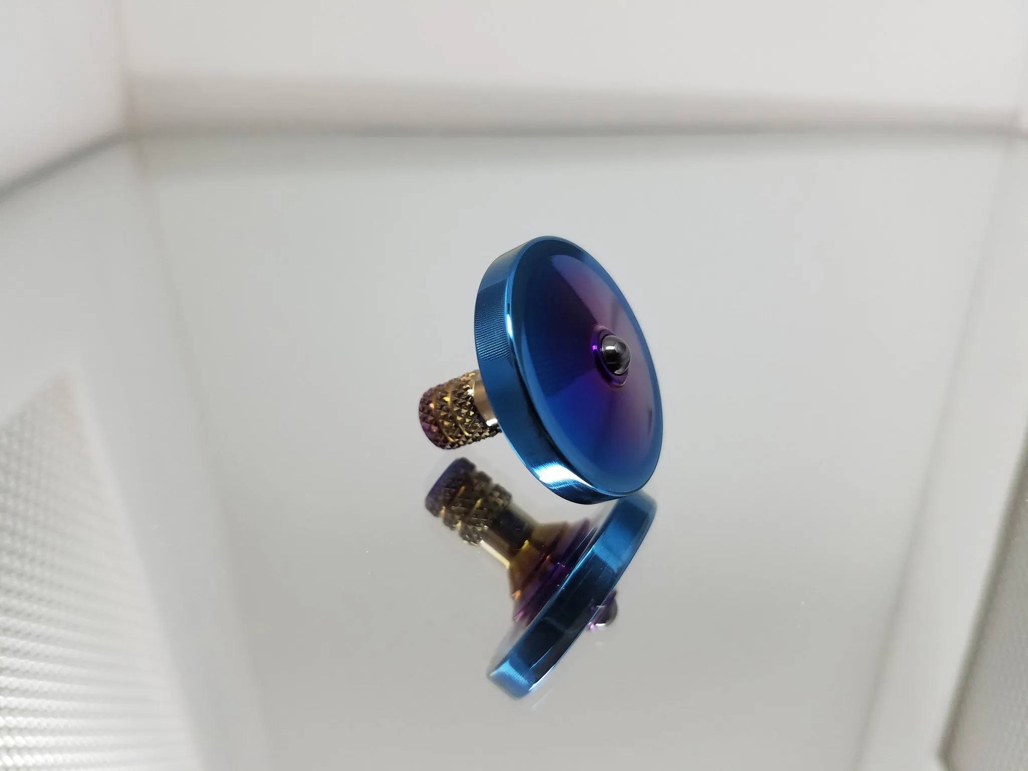 Titanium Spinning Top with a Heat Anodized Finish