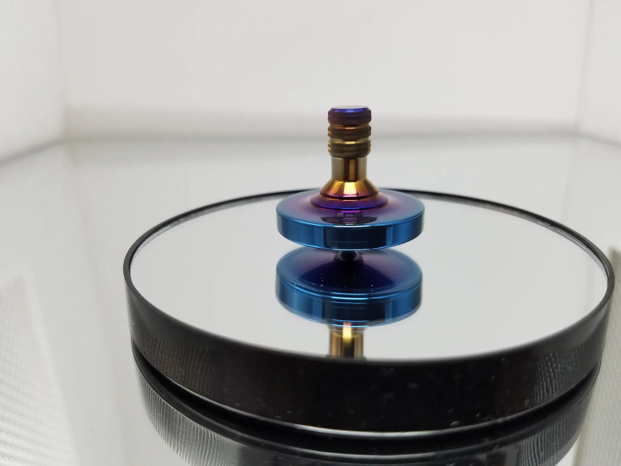 Titanium Spinning Top with a Heat Anodized Finish